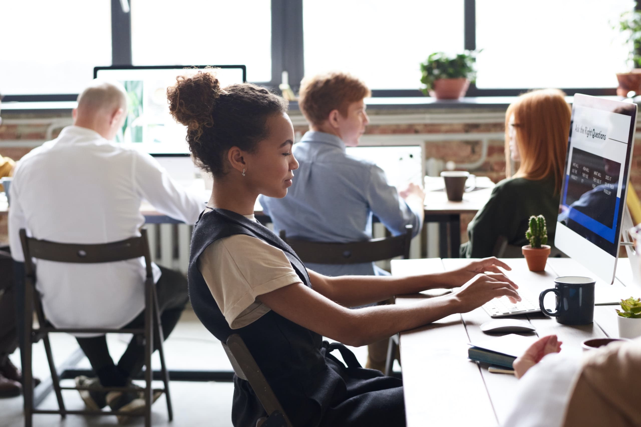 Team working in an open office layout